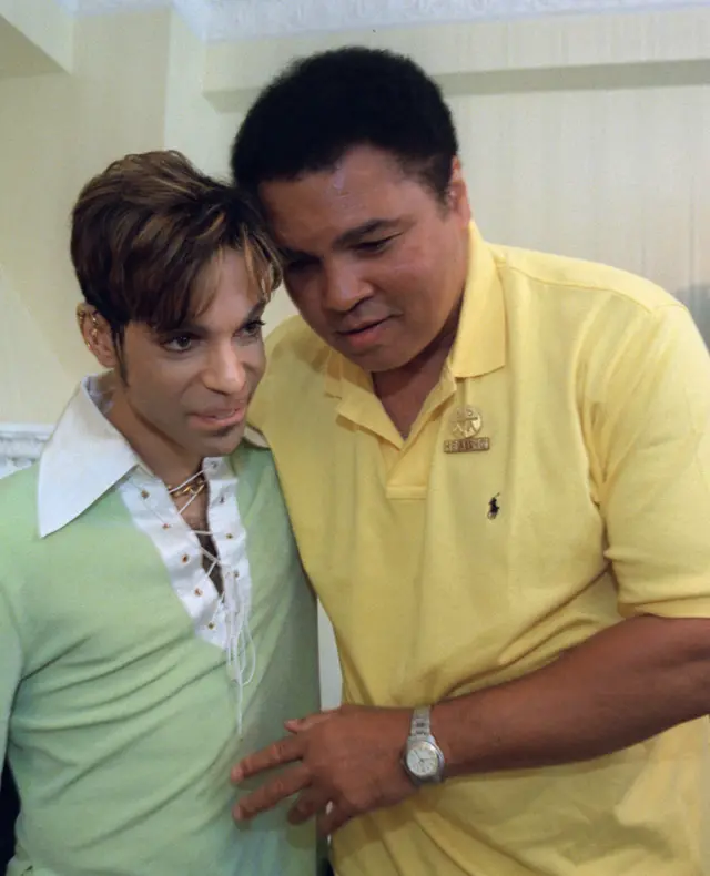 Prince (left) and Muhammad Ali