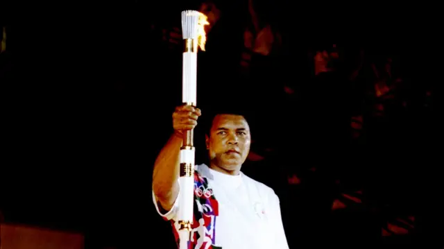 Muhammad Ali with the Olympic torch in Atlanta in 1996