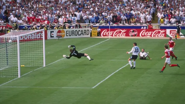 Alan Shearer scores against Switzerland