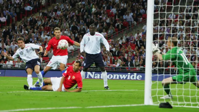 Michael Owen scores against Russia