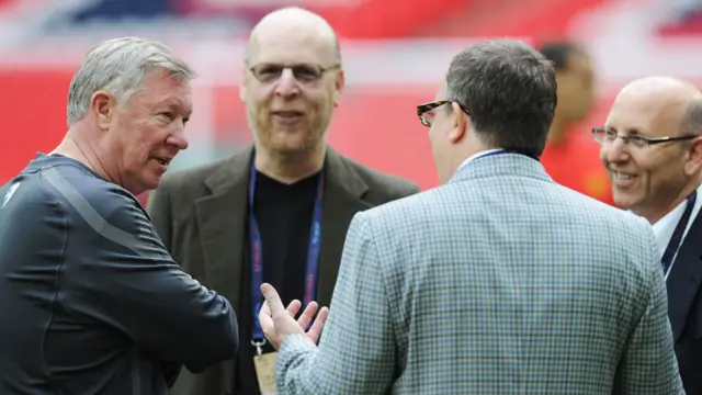 Joel, Avram and Bryan Glazer