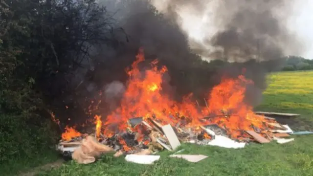 The fire takes hold of the rubbish