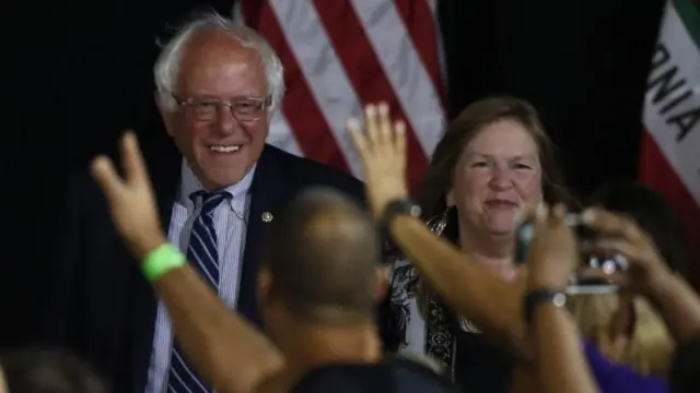 Bernie Sanders (left) and his wife Jane appear before supporters in Santa Monica