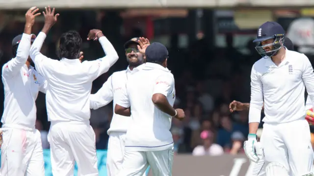 Sri Lanka's players celebrate the wicket of James Vince