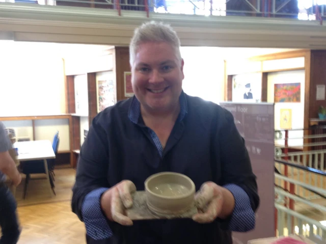 Jonathan Lampon and a piece of pottery