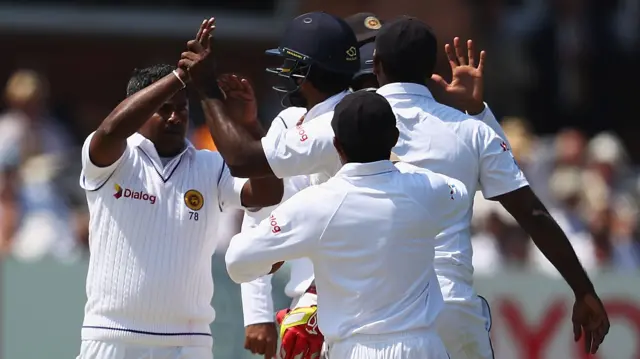 Sri Lanka's players celebrate the wicket of Alex Hales