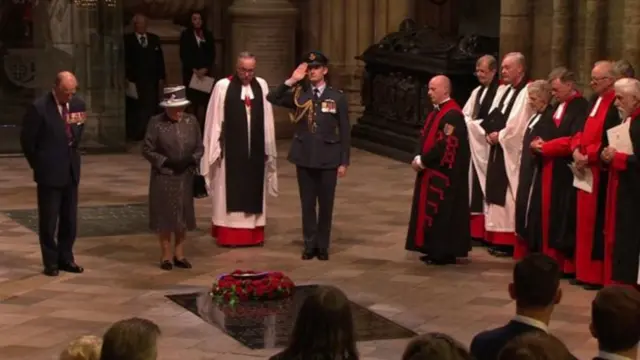 The Queen lays flowers at the Grave of the Unknown Warrior at Westminster Abbey