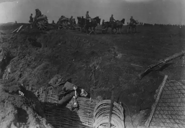 Dead soldier in a trench