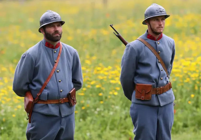 Two men in French WW1 uniform during Somme centenary commemorations