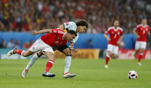 Hal Robson-Kanu tackles Axel Witsel