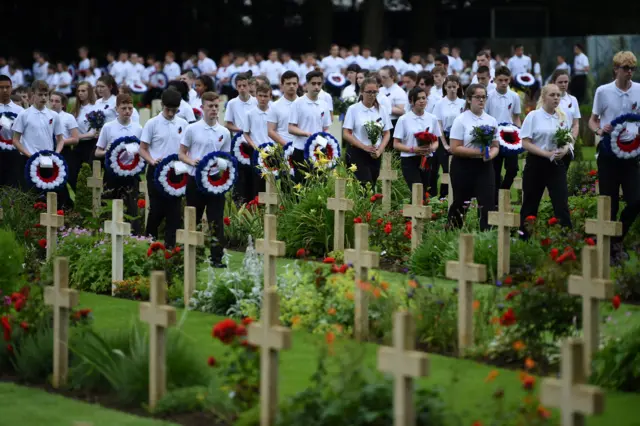 Schoolchildren lay wreaths at Thiepval monument