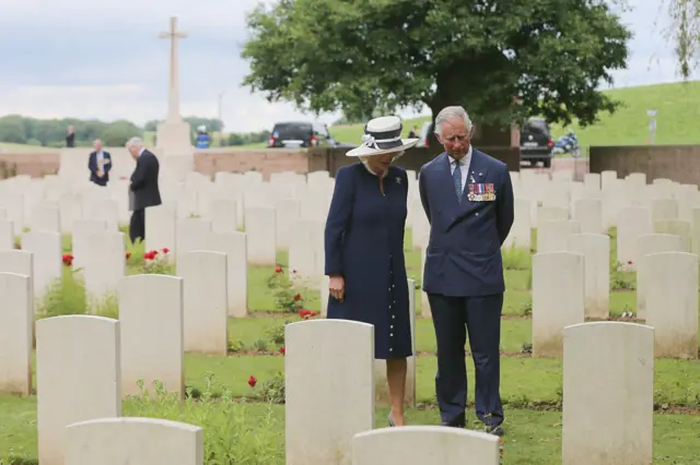 Duchess of Cornwall and Prince of Wales at at Carnoy Military Cemetery in Carnoy