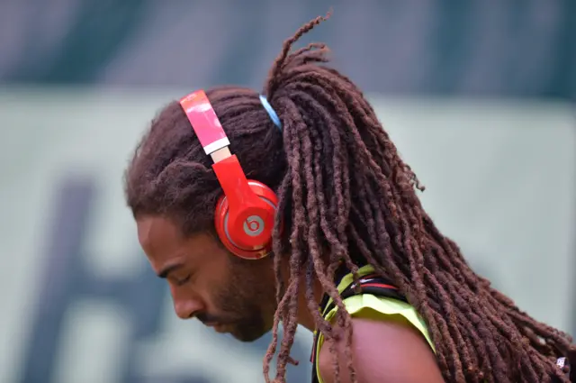 Dustin Brown wearing headphones