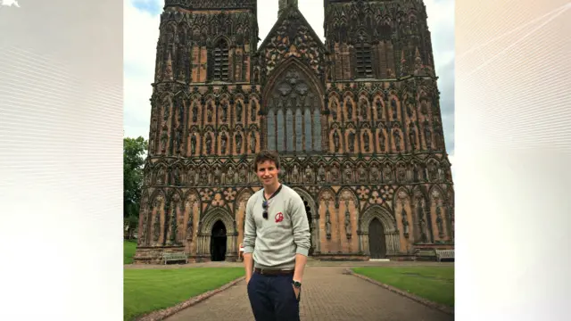 Eddie Redmayne outside the cathedral