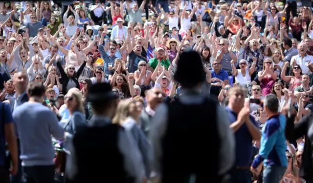 Fans on hill