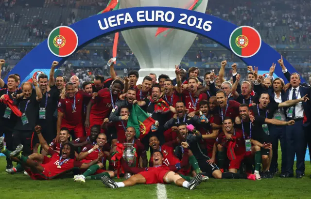 Portugal celebrate with the trophy