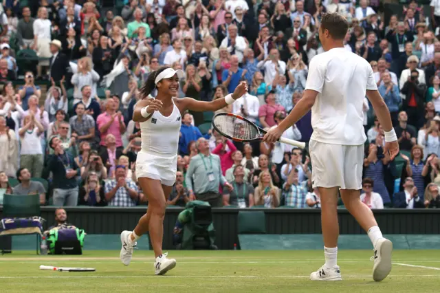 Heather Watson and Henri Kontinen celebrate