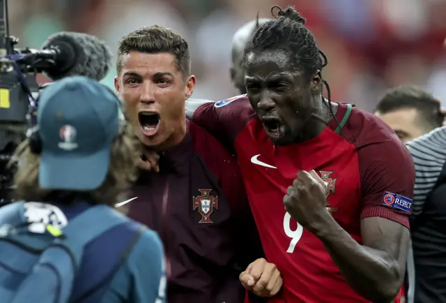 Eder and Cristiano Ronaldo celebrate