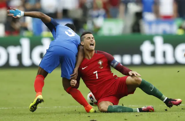 Cristiano Ronaldo is tackled