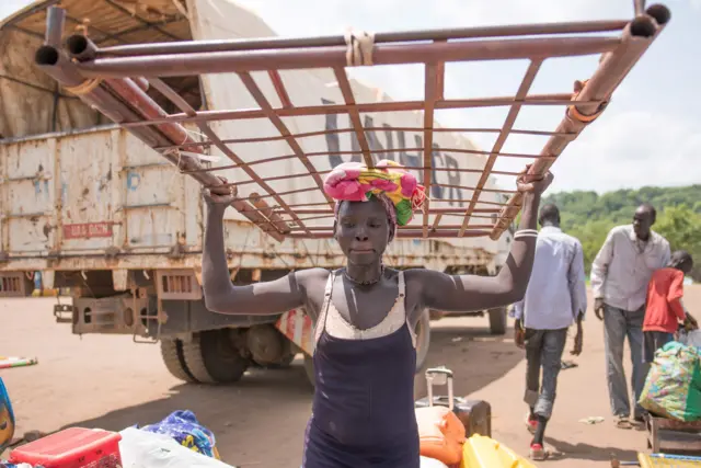 South Sudanese Refugees arrive at a refugee permanent settlement on June 4, 2016, Adjumani District in Uganda.