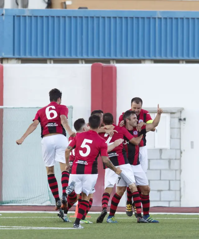 Lee Casciaro (right) celebrates giving Lincoln Red Imps the lead