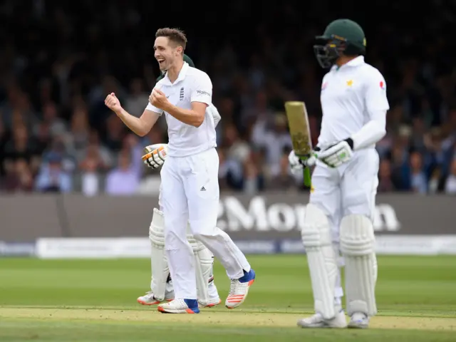 Chris Woakes celebrates his wicket