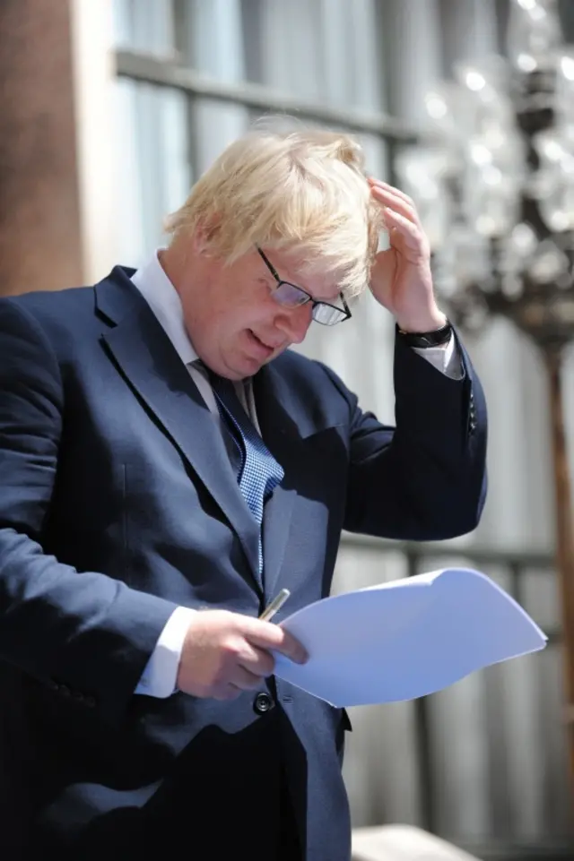 Foreign Secretary Boris Johnson addresses staff inside the Foreign Office in London