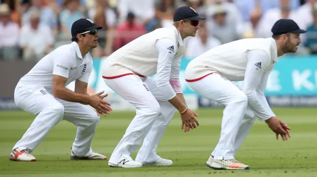 England's players field in the slips