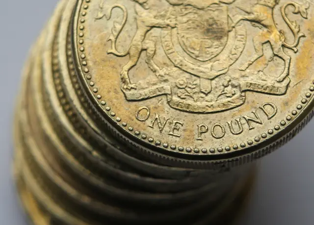 Pile of pound coins