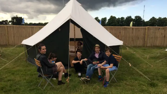 Martin family outside their tent