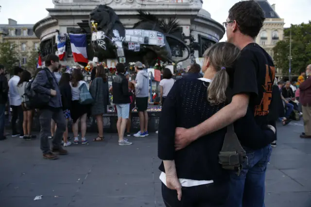 People gather at the Place de la Republique in Paris to pay tribute to the victims of an attack on 15 July 2016.