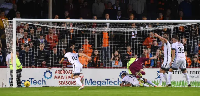 Colin Hamilton bundles the ball over the line for Arbroath