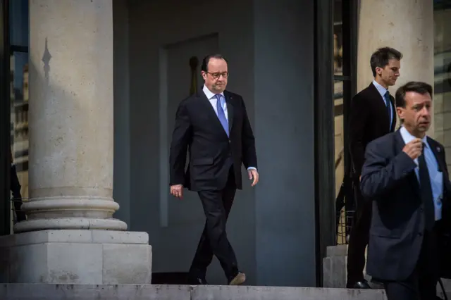 Francois Hollande leaves the Elysee Palace after a security cabinet meeting in Paris