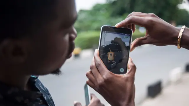 Playing Pokemon go in Lagos