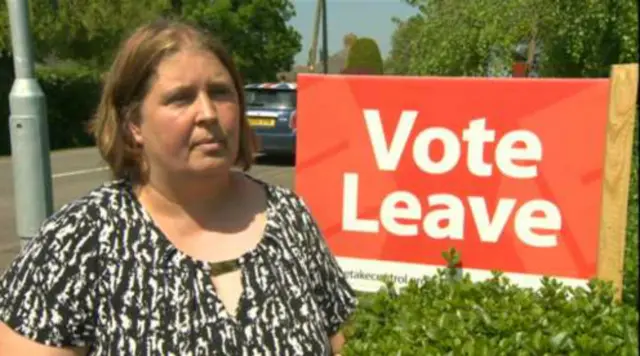 Lisa Duffy standing in front of Vote Leave sign