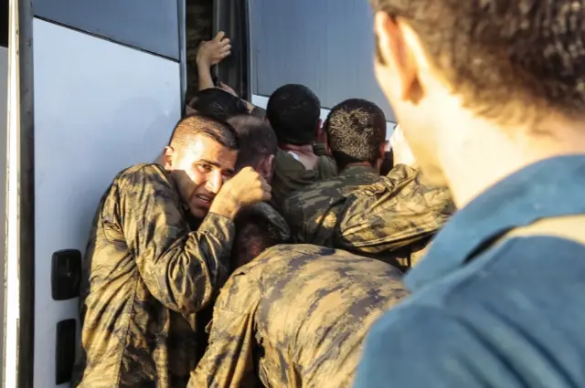 Soldiers involved in the coup attempt surrender on Bosphorus bridge