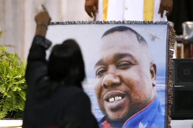 Alton Sterling larger-than-life photograph, at funeral on 15 July 2016