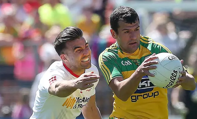 Tyrone'sTiernan McCann in action against Donegal's Frank McGlynn