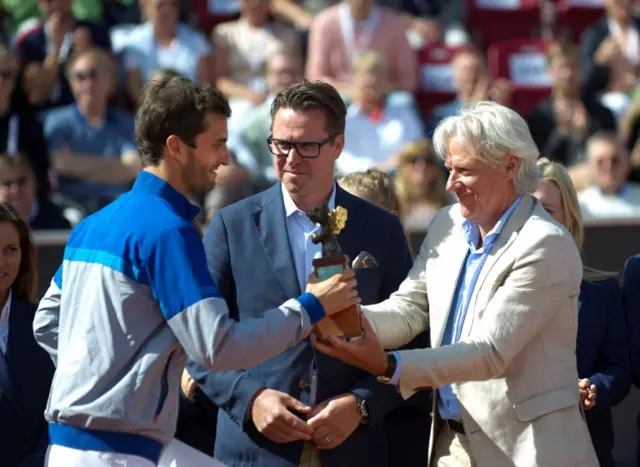 Bjorn Borg presents the trophy