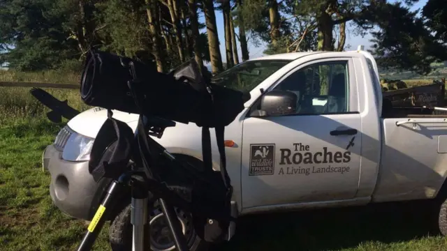 Scopes used to view birds infront of van