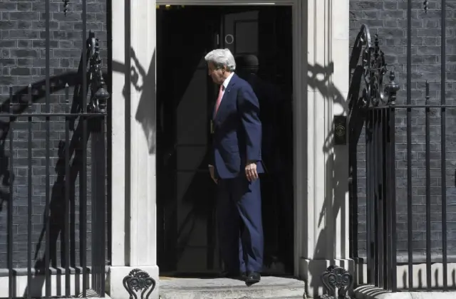 John Kerry outside Downing Street