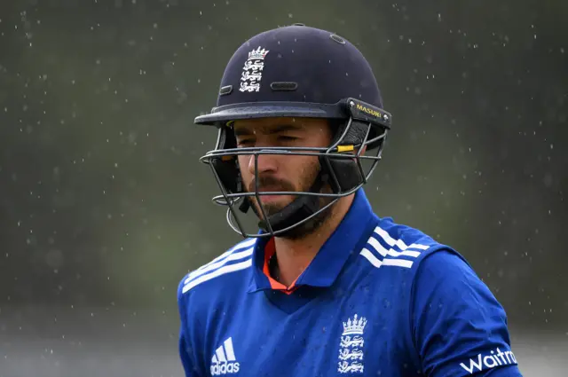 James Vince walks off for a rain delay