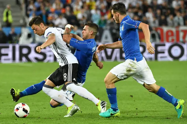 Mesut Ozil keeps off Stefano Sturaro