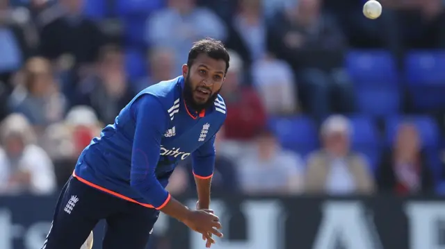 Adil Rashid bowls