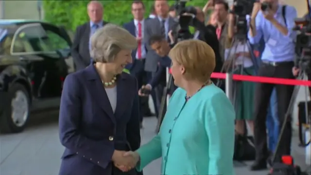 Theresa May and Angela Merkel