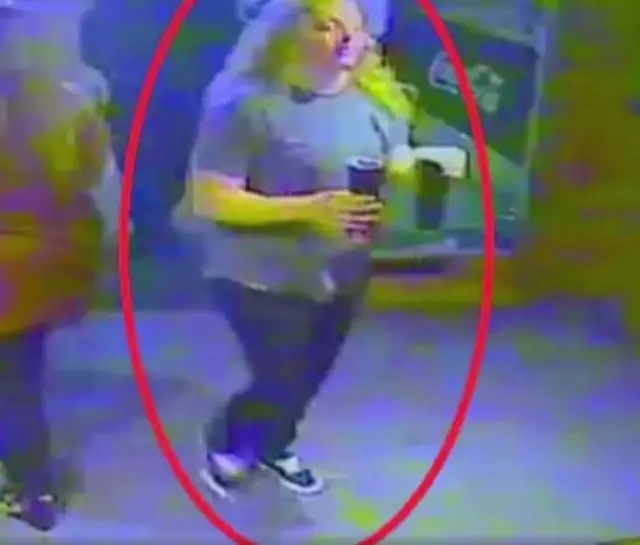 CCTV image of woman