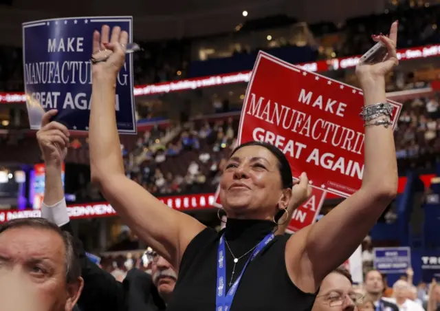 Members of the New York delegation celebrate after the state pushed Republican U.S. presidential candidate Donald Trump over the top to clinch the nomination during the second day of the Republican National Convention in Cleveland, Ohio, U.S. July 19, 2016