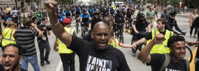 Black Lives Matter demonstrators march down the streets of downtown Cleveland during the Republican National Convention.