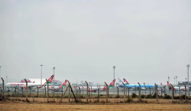 Kenya Airways airliners sit grounded on 14 August 2009 at Nairobi's Jomo Kenyatta International Airport