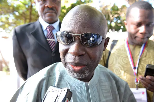 Ousainou Darboe speaks to journalists on November 24, 2011 after voting at a polling station in Serrekunda, southwest the capital Banjul, during the presidential election